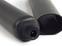 3-1 shrink ratio dual wall heat shrink tubing in black showing after shrinking and before shrinking.