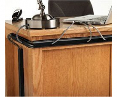 J-channel cord raceway mounted on desk