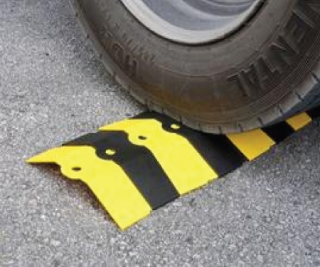 Large Sidewinder cord cover being vehicle-driven over over Large Sidewinder cord cover being vehicle-driven over over